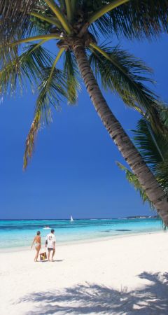 Couple On A Beach In Mauritius