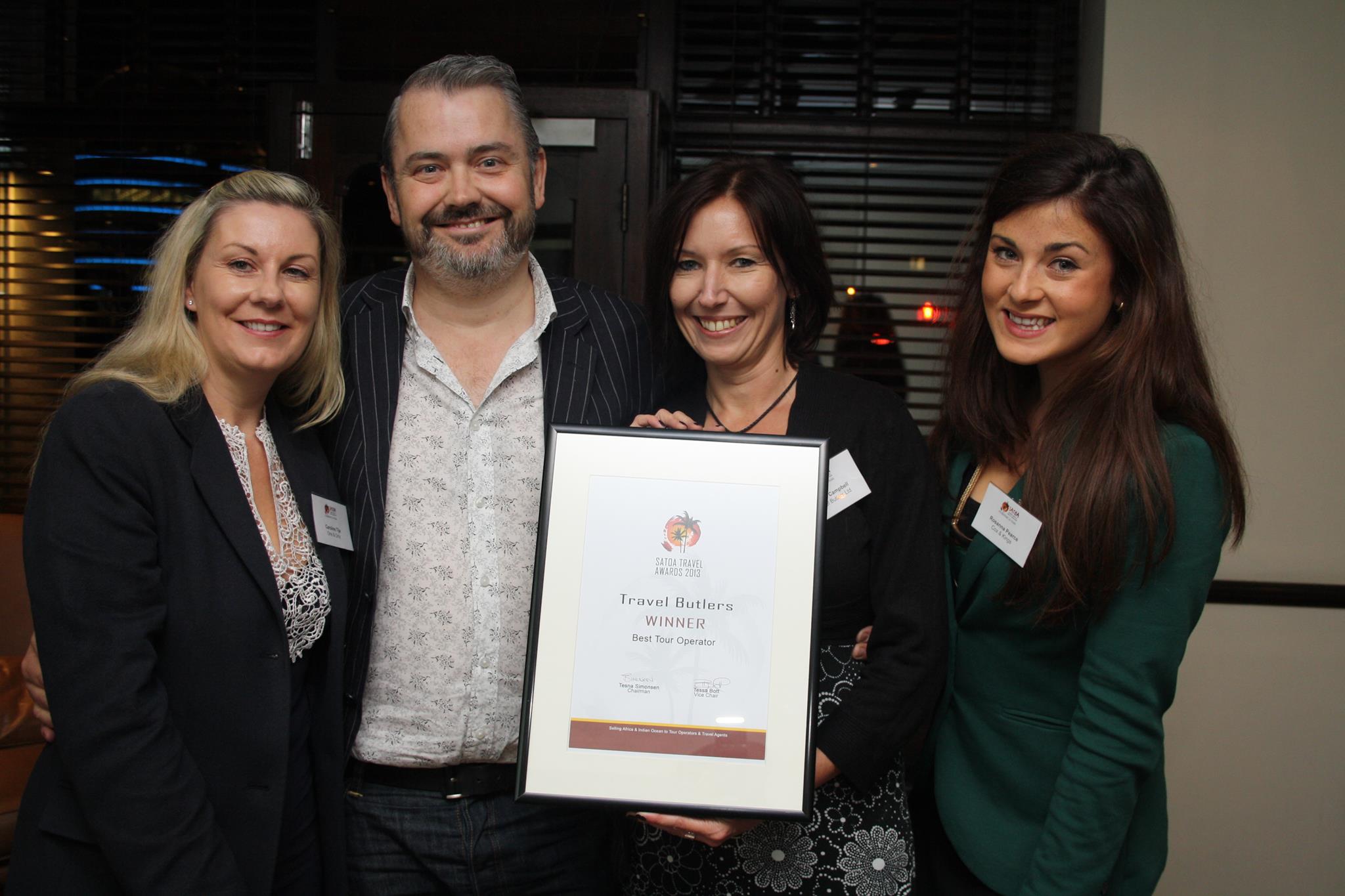 Tracey and Paul Campbell of Travel Butlers accepting the SATOA Best Tour Operator Award 2013